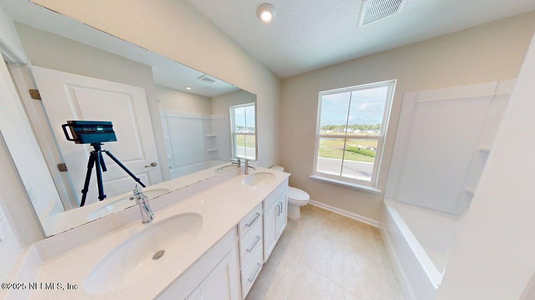 Furnished interior view inside a new home in Lakes at Bella Lago, Green Cove Springs (Image 9). Furnished interior view inside a new home in Lakes at Bella Lago, Green Cove Springs (Image 9).