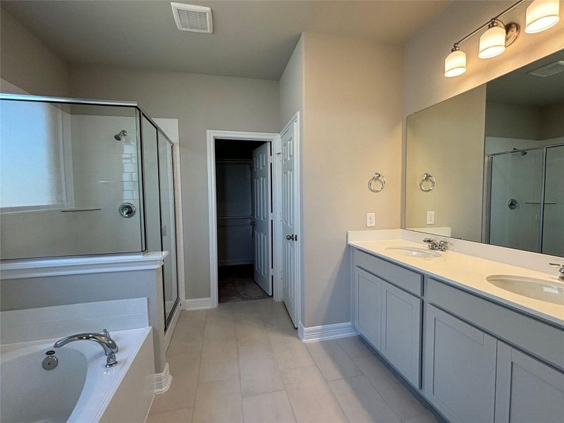 Furnished interior view inside a new home in Sunterra, Katy (Image 7).