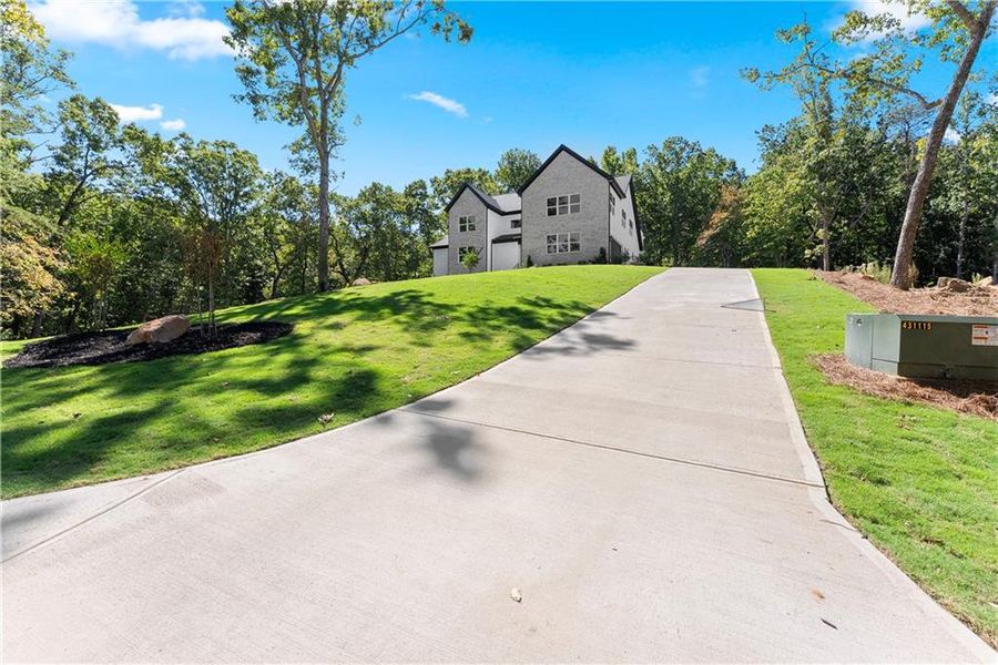 Front exterior of a new home in , Baldwin, GA, highlighting curb appeal (Image 28).