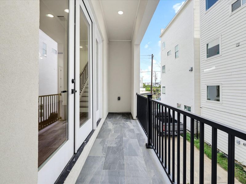 Exterior details and patio area of a home in , Houston (Image 3).