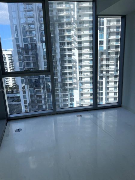 Condo located in Miami, FL showcasing its design and architecture (Image 4).