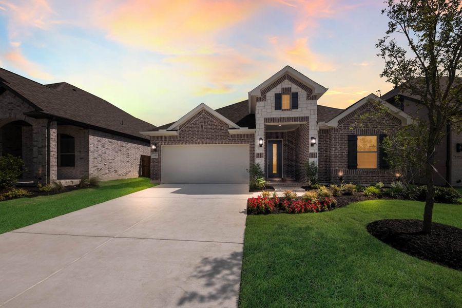 Front exterior of a new home in Las Lomas, Forney, TX, highlighting curb appeal (Image 17). Front exterior of a new home in Las Lomas, Forney, TX, highlighting curb appeal (Image 17).