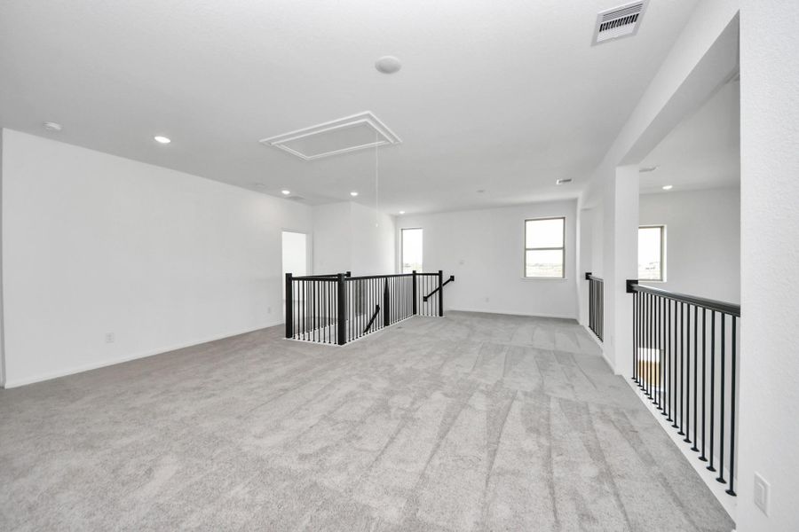 Spacious, unfurnished interior of a new home in 50' Traditional Homes at Elyson, Katy (Image 19).