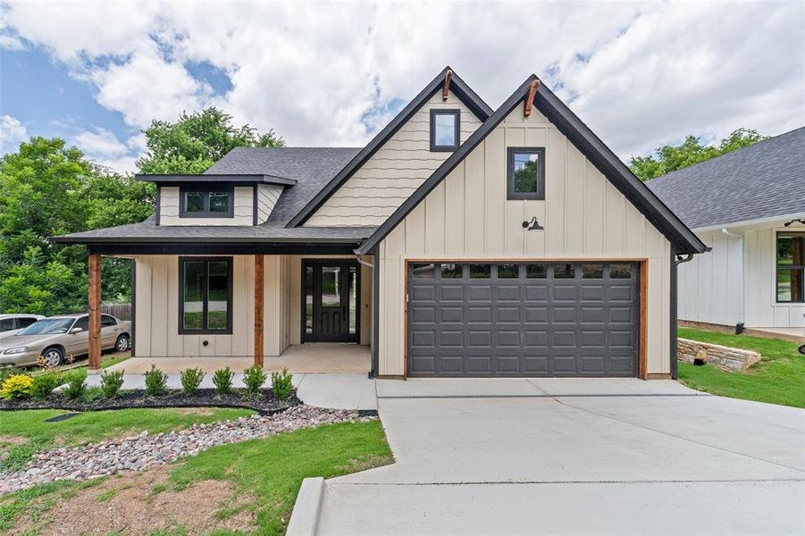 Front exterior of a new home in , Granbury, TX, highlighting curb appeal (Image 2). Front exterior of a new home in , Granbury, TX, highlighting curb appeal (Image 2).