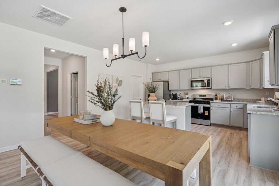 Furnished interior view inside a new home in Pine Hills at Cane Bay, Moncks Corner (Image 29).