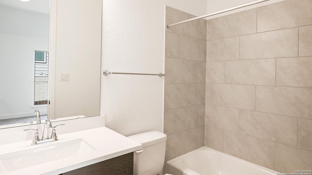 Furnished interior view inside a new home in Homestead 65', Schertz (Image 3).