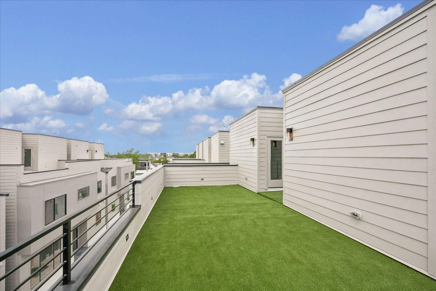 Exterior details and patio area of a home in , Houston (Image 3).