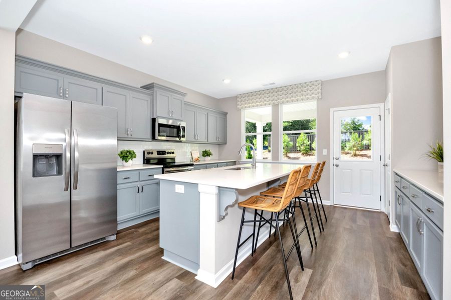 Furnished interior view inside a new home in Ivy Glen, Perry (Image 6).