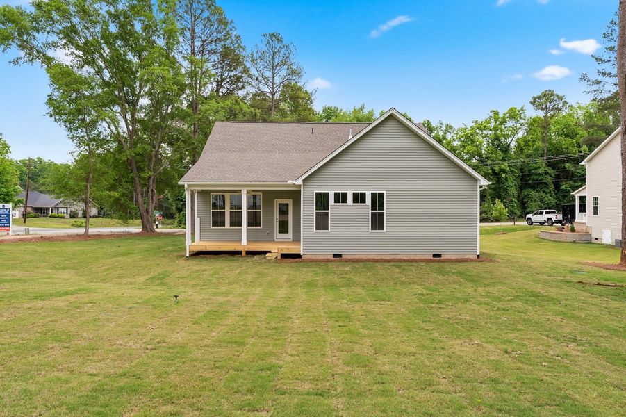 Exterior details and patio area of a home in Landing at Pine Lake, Anderson (Image 22).