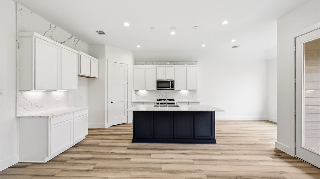 Furnished interior view inside a new home in Mill Creek Estates, Magnolia (Image 5).