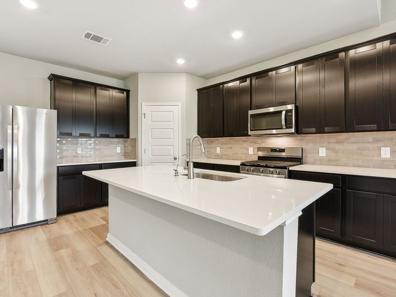 Furnished interior view inside a new home in Lakeside Meadows, Pflugerville (Image 3).