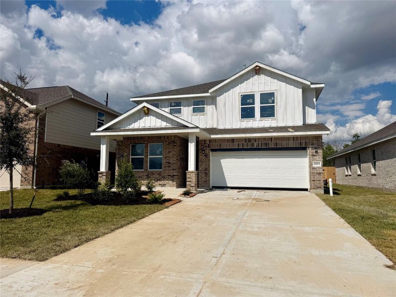 Two story home with 5 bedrooms, 3 baths, and 2 car garage.
