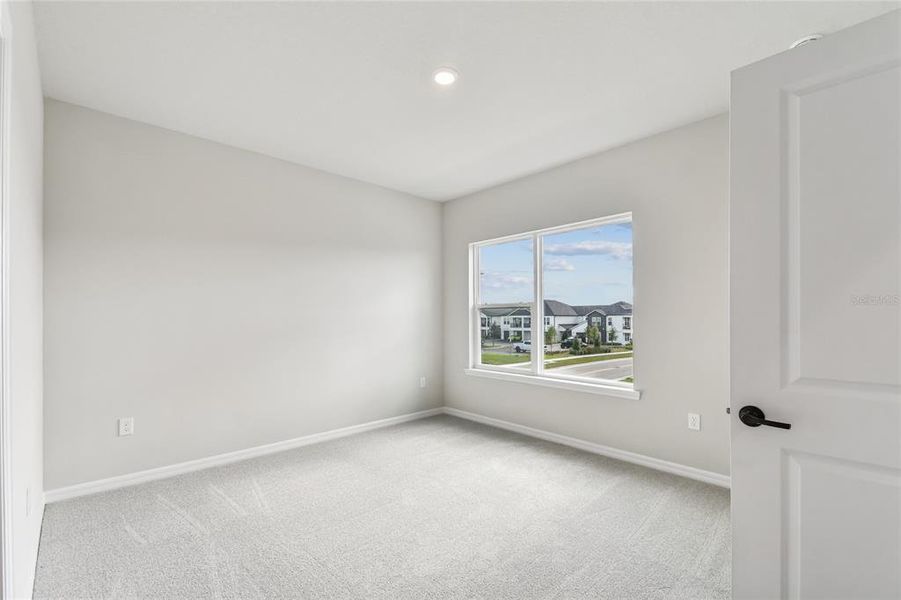 Spacious, unfurnished interior of a new home in John’s Lake North, Clermont (Image 20).