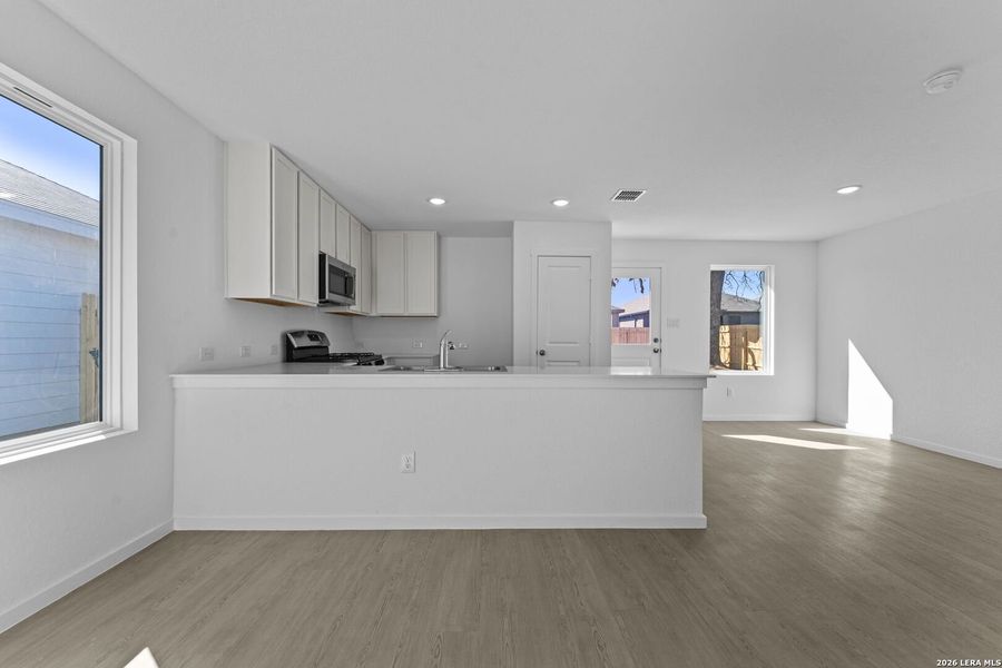 Furnished interior view inside a new home in Friendship Oaks, Fredericksburg (Image 7). Furnished interior view inside a new home in Friendship Oaks, Fredericksburg (Image 7).