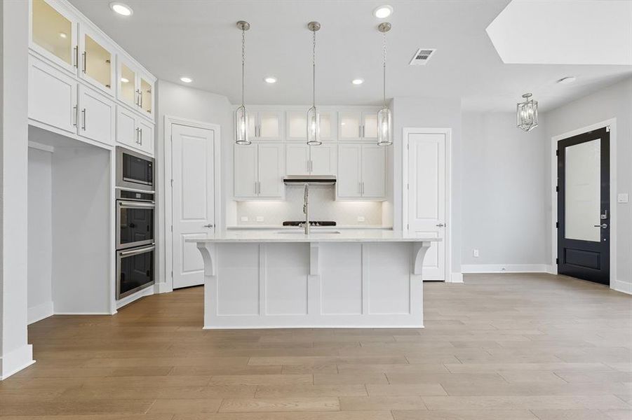 Furnished interior view inside a new home in Walsh: Townhomes - The Patios, Aledo (Image 15). Furnished interior view inside a new home in Walsh: Townhomes - The Patios, Aledo (Image 15).
