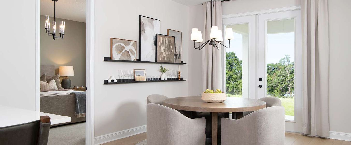 Representative furnished interior of a home built from the Badland by Ashton Woods in Catamaran Cove Traditional, Rockledge (Image 11).