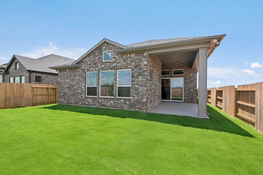 Front exterior of a new home in Grange 45' Homesites, Katy, TX, highlighting curb appeal (Image 9). Front exterior of a new home in Grange 45' Homesites, Katy, TX, highlighting curb appeal (Image 9).