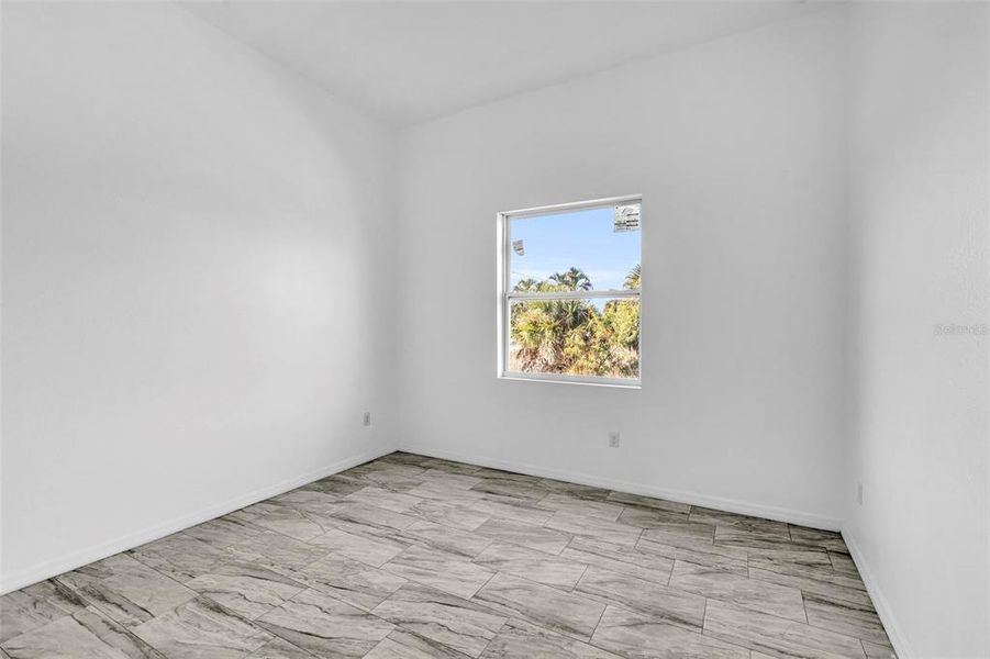 Spacious, unfurnished interior of a new home in , Port Charlotte (Image 12).