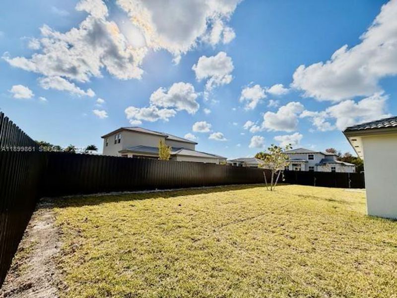 Exterior details and patio area of a home in Hawthorne at Galiano Pointe, Miami (Image 4).