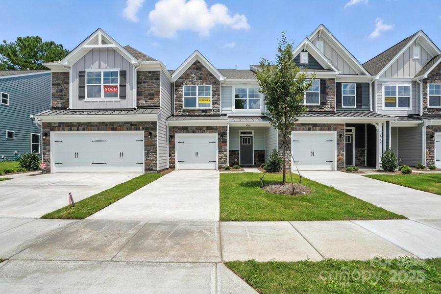 Front exterior of a new home in Harrisburg Village Townhomes, Harrisburg, NC, highlighting curb appeal (Image 20).