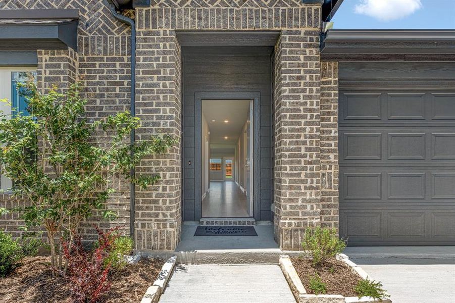 Front exterior of a new home in Heartland Elements, Crandall, TX, highlighting curb appeal (Image 27). Front exterior of a new home in Heartland Elements, Crandall, TX, highlighting curb appeal (Image 27).