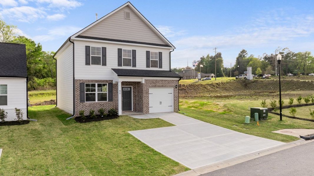 Front exterior of a new home in The Islands, Beech Island, SC, highlighting curb appeal (Image 1).