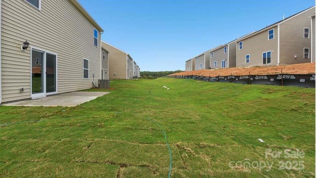 Exterior details and patio area of a home in Cardinal Creek, Charlotte (Image 18).