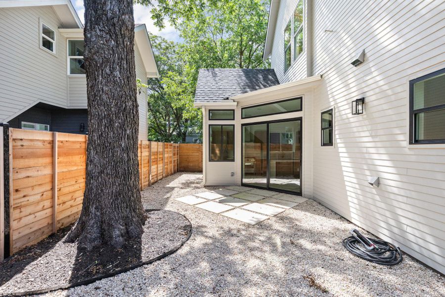 Fenced backyard with a patio Fenced backyard with a patio