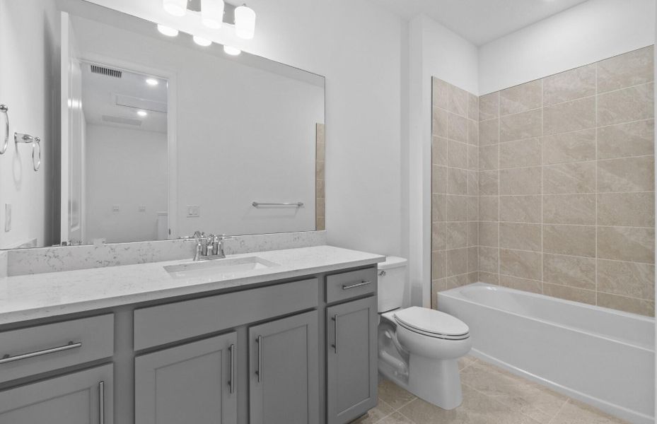 Furnished interior view inside a new home in Camellia, Stuart (Image 11).