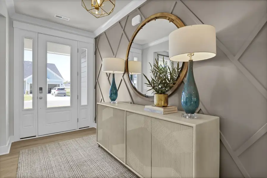 Representative furnished interior of a home built from the Webster II - Vanguard Collection by Mungo Homes in Scotts Hill Village, Wilmington (Image 3).