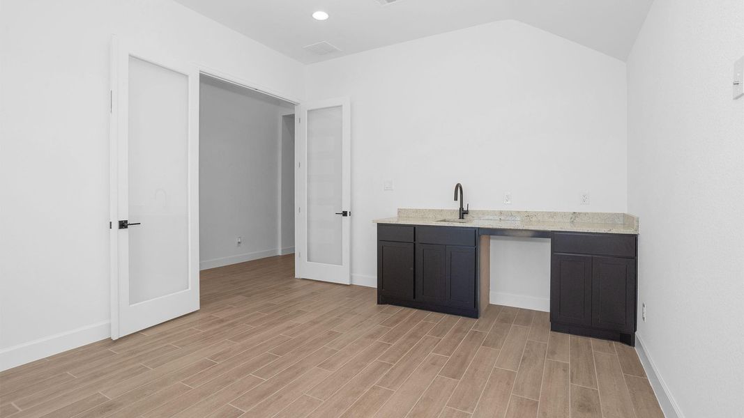 Furnished interior view inside a new home in Legacy, League City (Image 7).