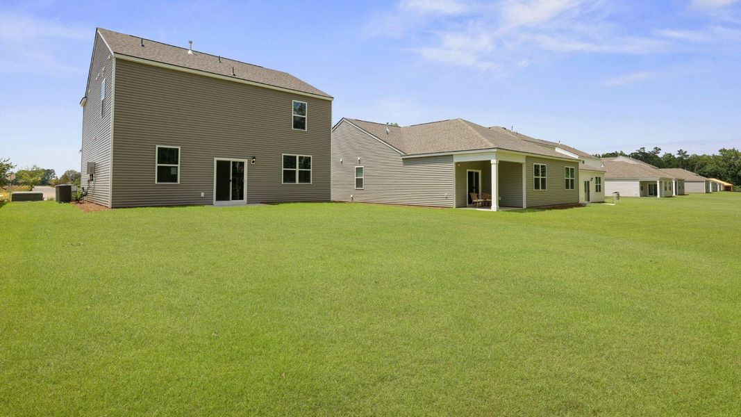 Front exterior of a new home in Pineview North, Summerville, SC, highlighting curb appeal (Image 27).