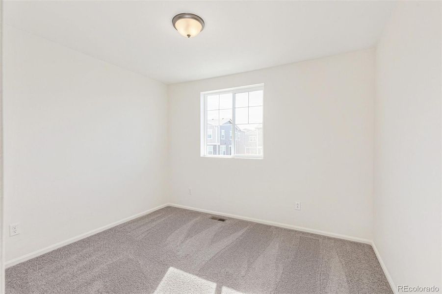 Spacious, unfurnished interior of a new home in Turnberry Villas, Commerce City (Image 27).