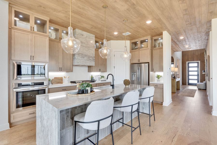 Representative furnished interior of a home built from the Premier Series - Elm by DRB Homes in Infinity Square, Kyle (Image 11).