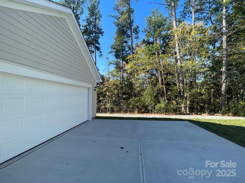 Exterior details and patio area of a home in Arbor Village, Matthews (Image 14).