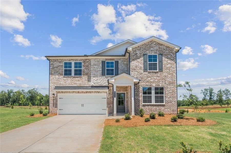 Front exterior of a new home in Walker Grove, McDonough, GA, highlighting curb appeal (Image 1). Front exterior of a new home in Walker Grove, McDonough, GA, highlighting curb appeal (Image 1).
