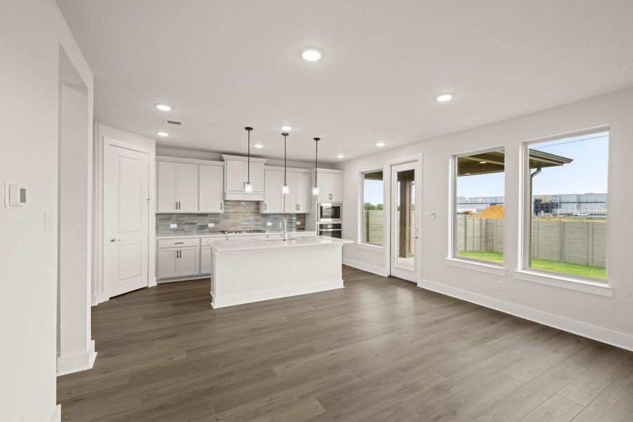 Spacious, unfurnished interior of a new home in Cottage Collection at Harvest, Argyle (Image 18).