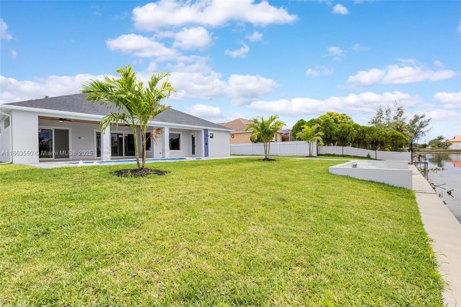 Front exterior of a new home in , Cape Coral, FL, highlighting curb appeal (Image 1). Front exterior of a new home in , Cape Coral, FL, highlighting curb appeal (Image 1).