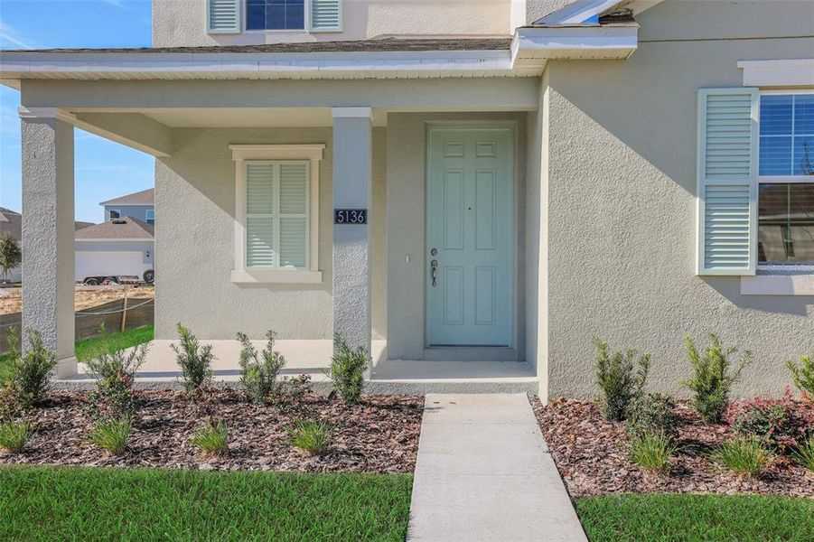 Exterior details and patio area of a home in Crossroads at Kelly Park, Apopka (Image 25).