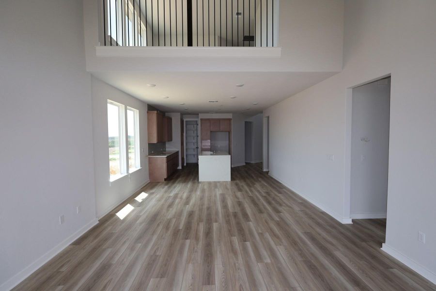 Spacious, unfurnished interior of a new home in Terrace Collection At Turner's Crossing, Buda (Image 7).