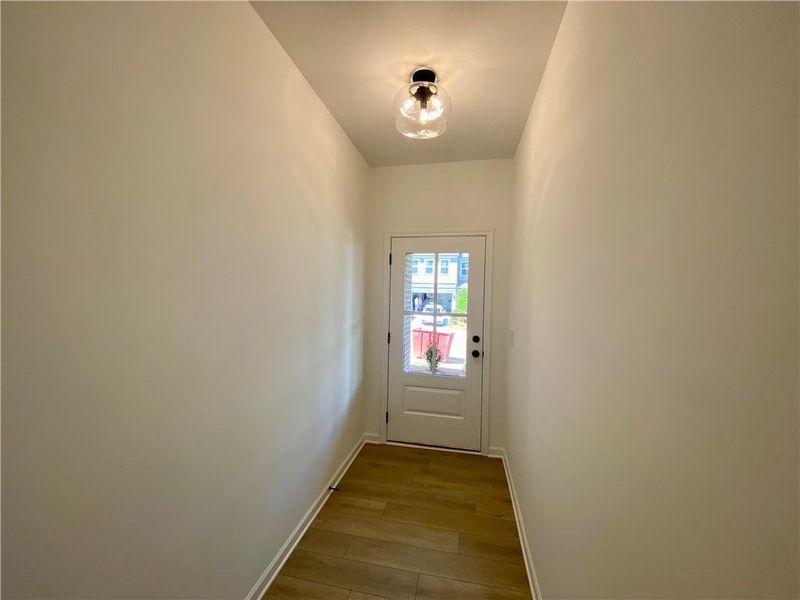 Spacious, unfurnished interior of a new home in Eastlyn Crossing, Flowery Branch (Image 13).