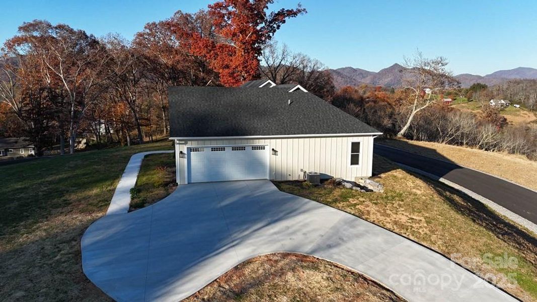 Front exterior of a new home in , Clyde, NC, highlighting curb appeal (Image 19).