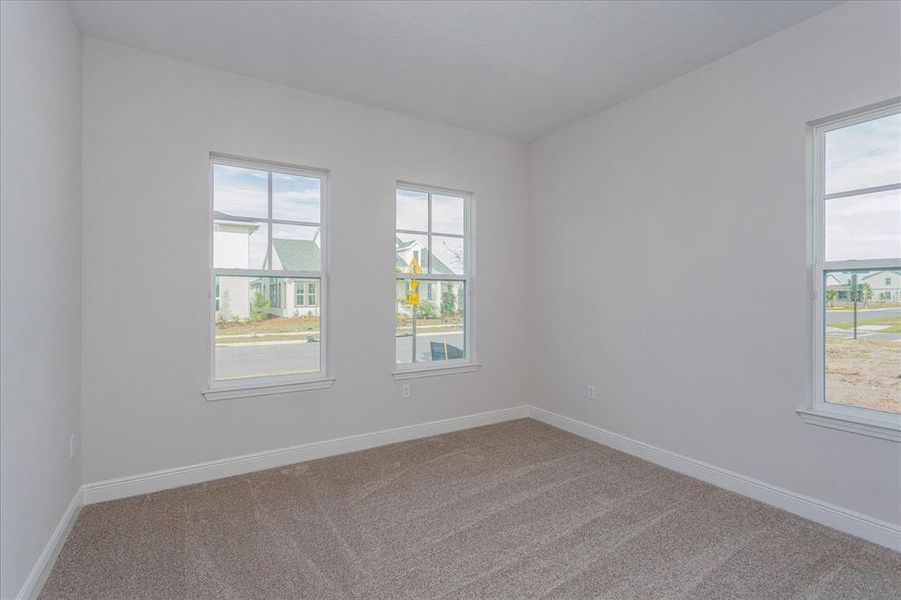 Spacious, unfurnished interior of a new home in Laureate Park at Lake Nona, Orlando (Image 14).