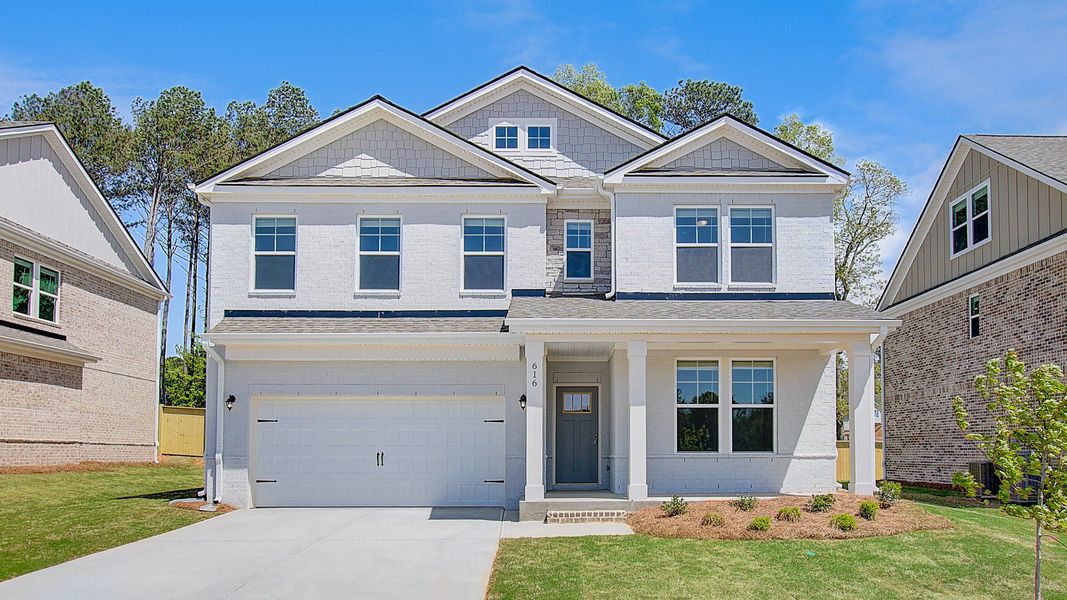 Representative exterior photo of a completed home built from the Wagener by DRB Homes in Bowers Farm, McDonough, GA (Image 24).