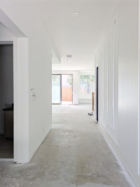Large wide entry hall with entry to Study/5th bedroom and downstairs full bath. Large wide entry hall with entry to Study/5th bedroom and downstairs full bath.