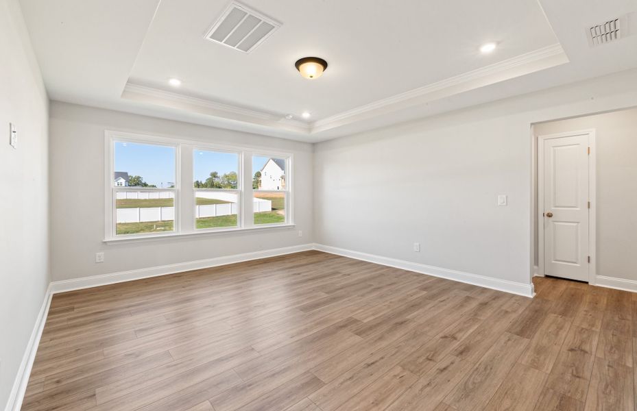Spacious, unfurnished interior of a new home in Browning Stables, Wendell (Image 47).