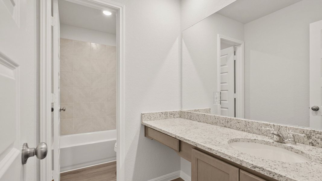 Furnished interior view inside a new home in Hunters Ranch, San Antonio (Image 9).