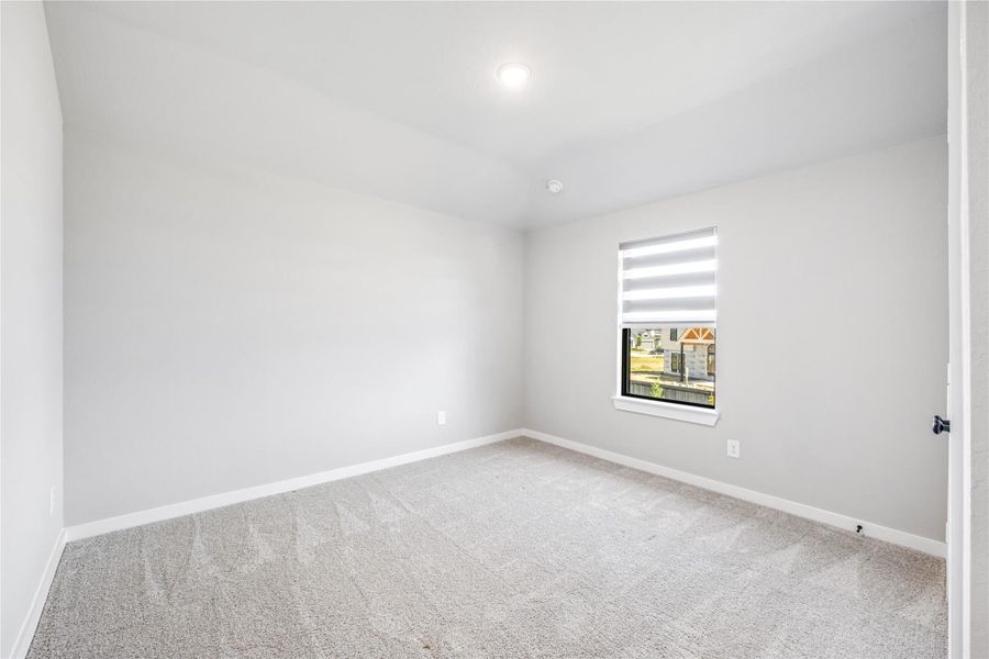 Spacious secondary bedroom with ample closet space