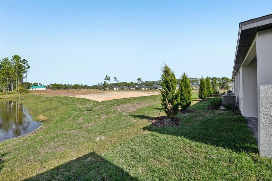 Exterior details and patio area of a home in Ridgehaven - Villas, Ormond Beach (Image 22).