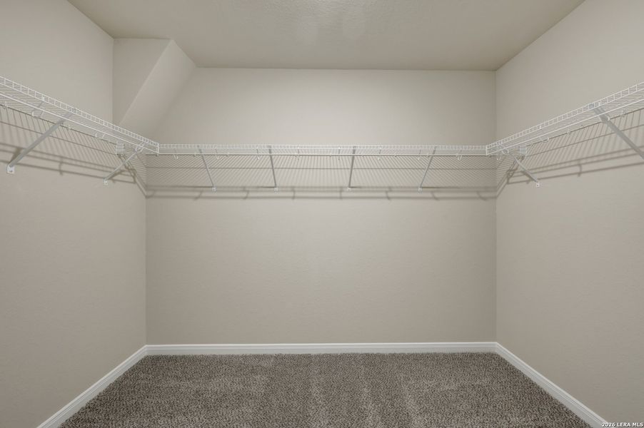 Spacious, unfurnished interior of a new home in Hunters Ranch, San Antonio (Image 12).